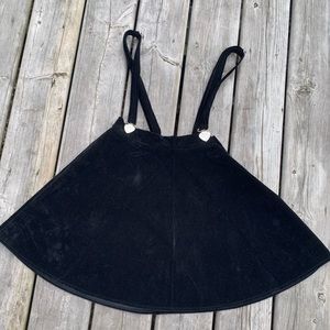 Black velvet skirt with suspenders